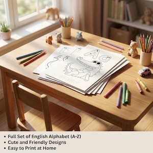 May include: A wooden table displays a stack of alphabet coloring pages with an alligator illustration. Colored pencils and crayons are scattered around the pages. The text on the pages reads "alligator" and "A". Small toy animals and a toy car are also on the table.