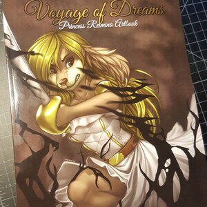May include: A book cover featuring the title "Voyage of Dreams" and "Princess Romina Artbook". The artwork depicts a blonde anthropomorphic character in a white dress, holding a sword, with black shadowy elements. The words "Second Edition" are also visible.