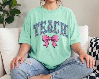 Comfort Colors® Teach Floral Bow T-Shirt, Teacher First Day School Shirt, Gift For Teacher, First Day Of School Shirt, Teach Grad Shirt