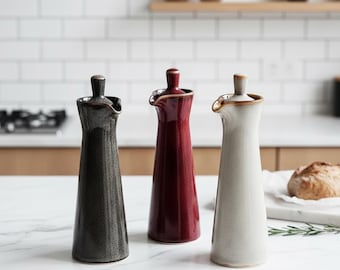 Dispensador de aceite de cerámica, vinagrera de salsa de soja y condimentos de cocina.