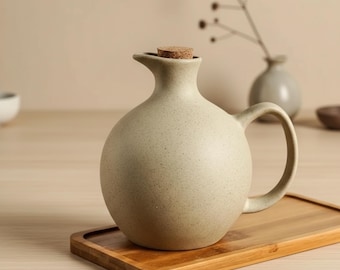 Aceitera de cerámica gruesa con tapa, recipiente de gran capacidad para almacenar aceite y salsas de cocina.