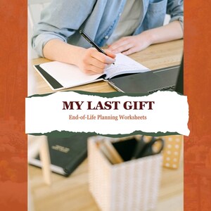 May include: A person writing in a notebook with a pen, with the text "MY LAST GIFT End-of-Life Planning Worksheets". A laptop, a basket with pens and scissors, and a notebook are also on the table.