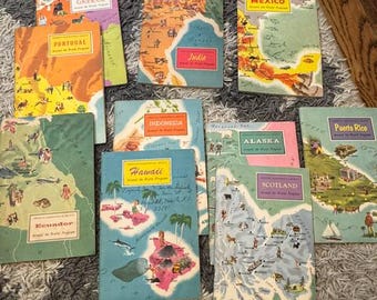 Vintage “Around the World Program” book collection from the American Geographical Society, published by Nelson Doubleday Inc. (circa 1950s).