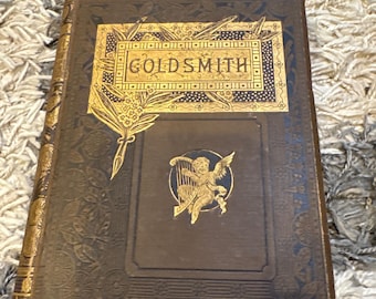 Antique Victorian Goldsmith Book (1880s) – Ornate Gilt Cover with Cherub – Decorative Cloth Binding – Dark Academia Library Decor