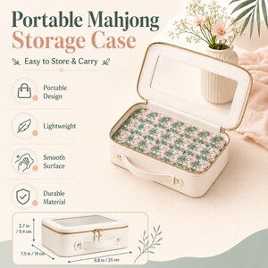 May include: A white rectangular portable Mahjong storage case with a top handle, gold-tone zipper, and a clear window on the lid. The case contains tiles with a green and pink floral pattern. Dimensions are 9.8 inches by 7.5 inches by 3.7 inches.