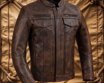 May include: A brown leather jacket with a distressed finish. The jacket features a stand-up collar, multiple front pockets, and a zip-up closure. The jacket has a vintage, worn look.