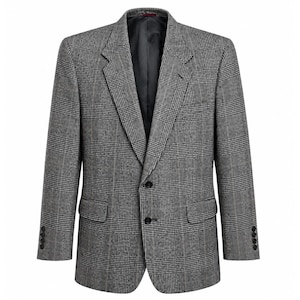 May include: A gray plaid blazer with a classic two-button closure. The jacket features a notched lapel, two front pockets, and four buttons on each cuff. The interior lining is a dark gray color.