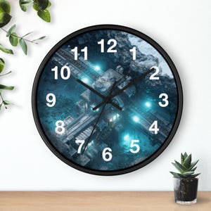 May include: A round wall clock with a black frame. The clock face features a futuristic, blue-toned cityscape with white numerals and black hands. The clock is on a wooden surface.