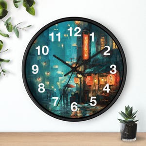 May include: A round wall clock with a black frame. The clock face features a painting of a rainy street scene with Japanese lanterns and buildings. White numbers mark the hours. The clock hands are black.