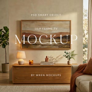 May include: A wooden media console with a framed landscape painting, a lamp, and decorative items. The painting is labeled "16:9 FRAME TV MOCKUP". The text "BY WREN MOCKUPS" is at the bottom. A plant and a sofa are also visible.