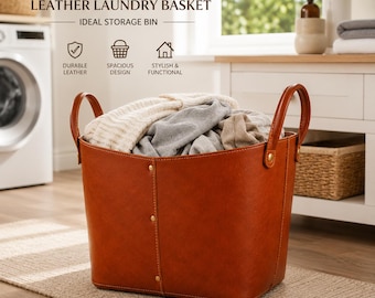 May include: A tan leather laundry basket with two handles and vertical stitching, filled with folded clothing. The text LEATHER LAUNDRY BASKET, IDEAL STORAGE BIN, DURABLE LEATHER, SPACIOUS DESIGN, and STYLISH & FUNCTIONAL is visible above the basket.