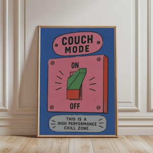 May include: A rectangular wall art print with a blue background featuring a pink switch plate graphic. The text reads COUCH MODE, ON, OFF, and THIS IS A HIGH PERFORMANCE CHILL ZONE. A green and red toggle switch is centred on the pink plate.