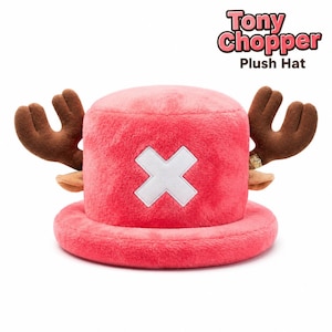May include: A pink plush hat featuring brown antlers on the sides and a white cross emblem on the front. The text Tony Chopper Plush Hat is printed in the upper right corner. The hat has a cylindrical crown and a wide brim, made of soft material.