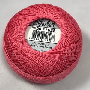 May include: A pink ball of 6-cord cordonnet embroidery thread, labelled "HHLizbeth Size 20 Col. 628", with a barcode and the text "25g = 210 yds Made in China".