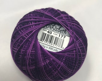 May include: A purple ball of embroidery floss with a white label that reads "Size 40 Col. 177" and "25g = 300 yds".