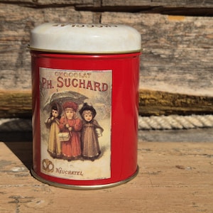 Vintage round chocolate tin Ph. Suchard Neuchatel, Switzerland, 1980s