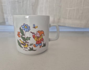 Vintage kids fairy tale mug with with a friendly fairy clown in the forest, Lubjana, Poland, 1980s