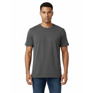 May include: A charcoal gray crew neck t-shirt. The short-sleeved shirt is made of a soft material and is being worn with blue jeans. The model is standing in front of a white background.