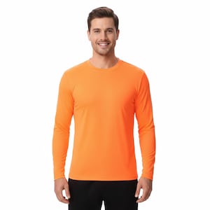 May include: A long-sleeved, crew neck shirt in a vibrant orange color. The shirt is made of a smooth, solid fabric and is worn by a person. The sleeves are long, and the fit appears to be comfortable. The person is wearing black pants.