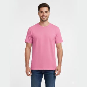 May include: A white ceramic mug with a black handle and the text "But First, Coffee" in a black, handwritten-style font. The mug is on a white surface.