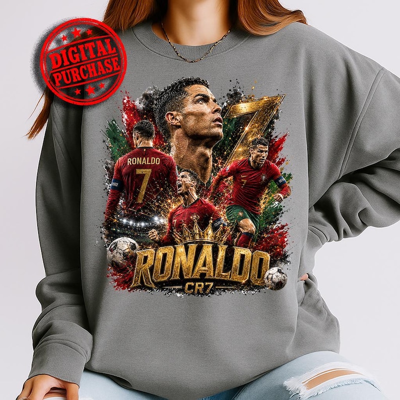 Gray sweatshirt mockup featuring a bold Ronaldo CR7 football graphic with multiple player poses, large gold number 7, crown detail, soccer balls, red and green paint splashes, black smoky textures, gold spark effects, and oversized metallic “RONALDO” lettering. Includes a red Digital Purchase stamp for a printable sports PNG digital download.