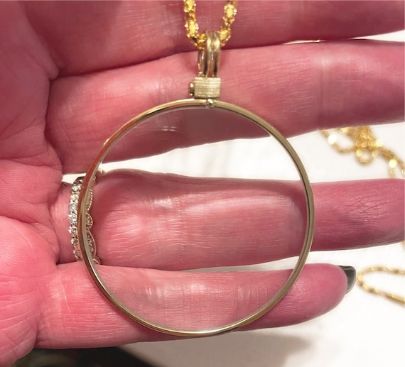 vintage avon magnifying glass necklace
