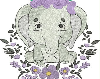 May include: An embroidered design of a light gray baby elephant sitting centered, wearing a crown of purple roses and green leaves. The elephant is surrounded by a circular wreath of purple flowers, small light purple buds, and dark gray leaves.