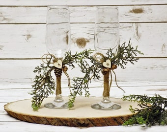 Rustic Winter Wedding Champagne Toasting Glasses | Personalized Champagne Flutes | Evergreen Wedding Table Decor | Pinecone Wedding Accents