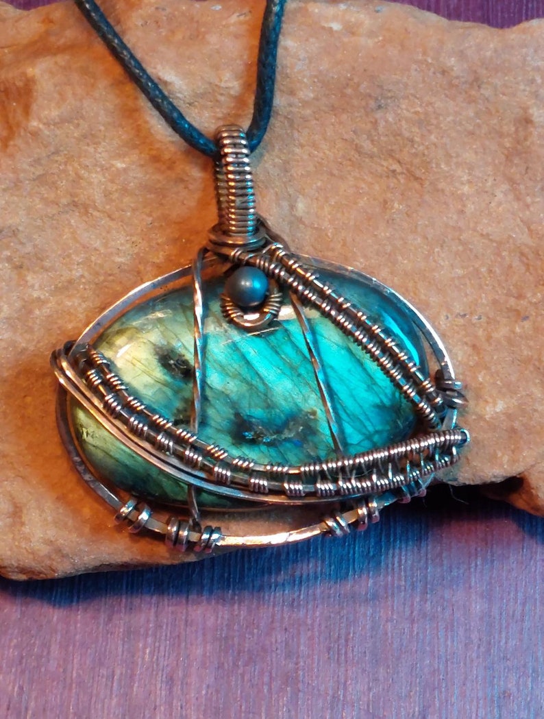 LABRADORITE, Bright Blue, 196, Hematite Bead, Pendant Wire wrapped with Copper on adjustable black cord necklace. MODEL. BPJ196 image 1