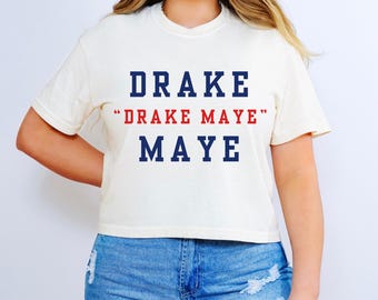 Camiseta Drake Drake Maye Maye, camiseta de jogo de futebol americano para mulheres, futebol americano da Nova Inglaterra