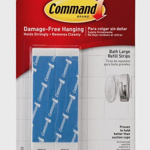 Tiras adhesivas Command de 3M, soportan 2,2 kg (5 libras), no dañan la superficie.
