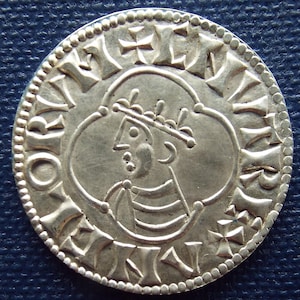 Replica Anglo Saxon silver penny of Cnut, 1016-35. Quatrefoil type.