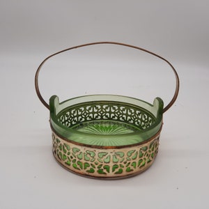 Uranium Vaseline glow glass candy dish in metal pierced intricate basket