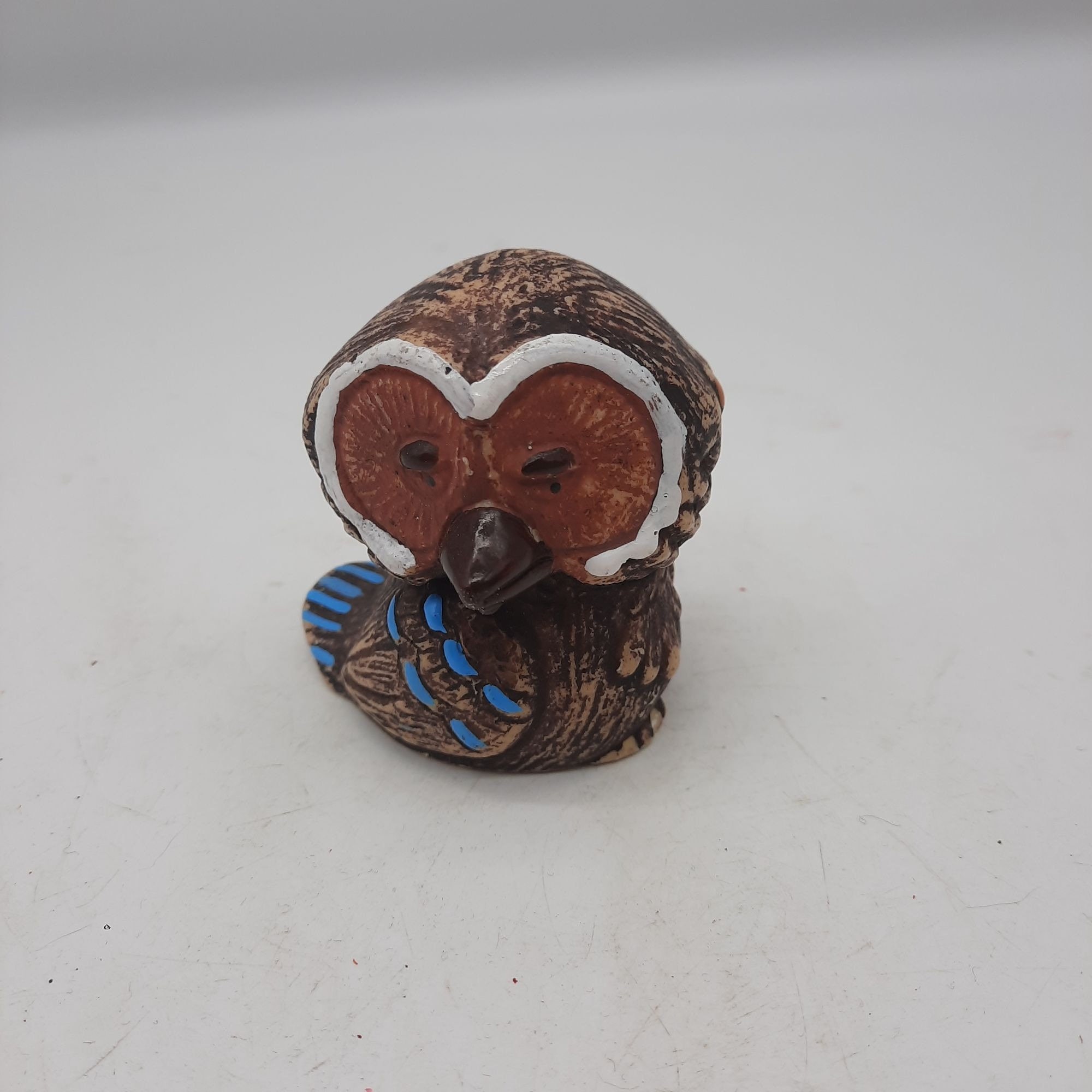 Decorative stoneware owl figurine orange and turquoise glaze accents