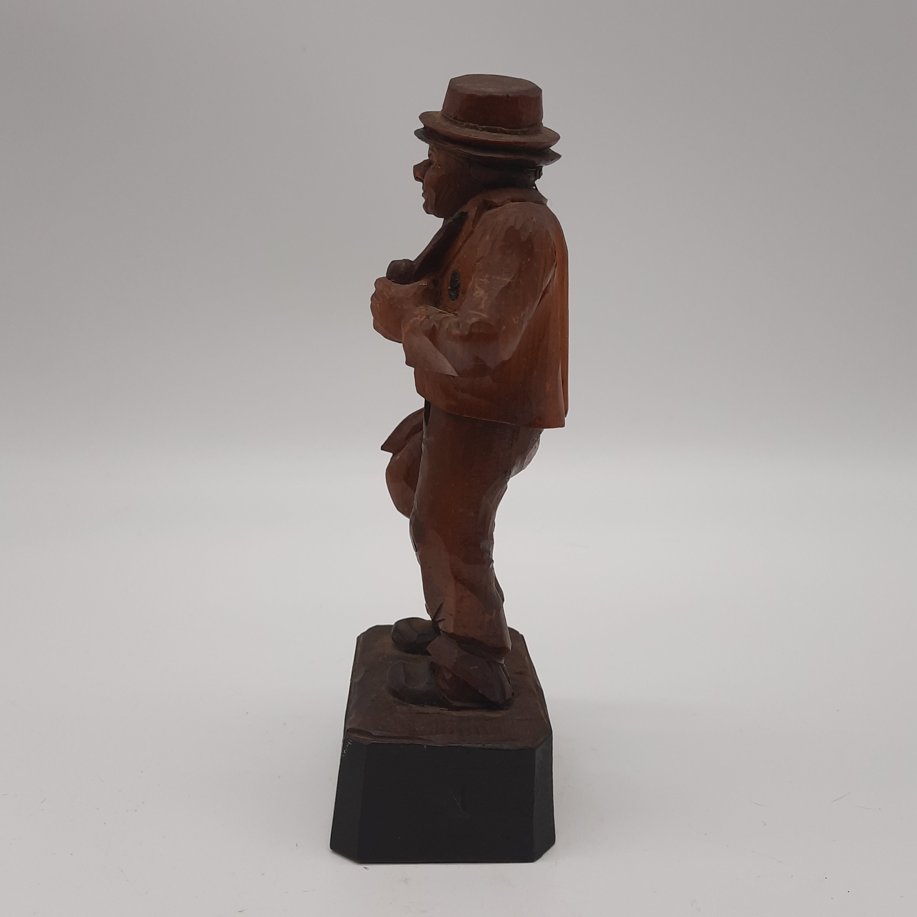 Vintage Black Forest Wood Carving Man Hat Bag Pipe Figurine