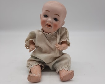 Early antique J.D. Kestner Bisque dome head character baby doll marked on head 3 jointed composition body 9" tall