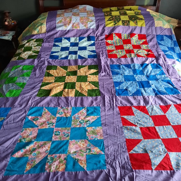 Unfinished star quilt top vibrant multicolored scraps with purple striping