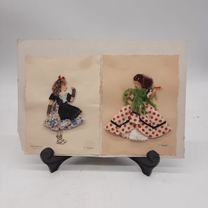 Vintage Spain traditionally dressed paper dolls cloth on paper signed C. Figueras