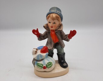 Napcoware Christmas Little Boy With Presents Figurine Winter Scene