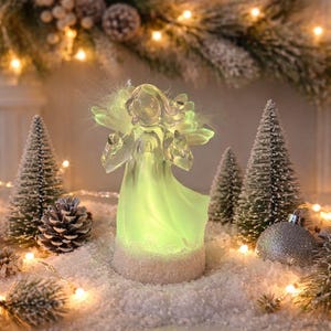 purple dressed black angel christmas light Exhart Solar Garden Stake with LED Wings The highlight of this piece is the mesmerizing color 12 in. Animated Black Angel