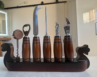 A set of vintage hand openers, a collector's item