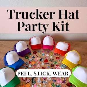 May include: A Trucker Hat Party Kit with seven colorful trucker hats with white fronts and mesh backs in blue, purple, red, pink, orange, yellow, and green. Assorted stickers are scattered around the hats. The text "PEEL. STICK. WEAR." is at the bottom.