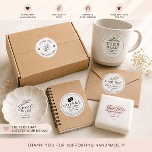 May include: A collection of round adhesive labels featuring various botanical and minimalist designs, applied to a cardboard box, a ceramic mug, a spiral notebook, a kraft paper envelope, a small scalloped dish, and a rectangular white box.