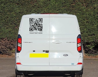 May include: White Ford Transit van with a black QR code and the text "YOUR TEXT HERE" on the back. The van has red taillights and a yellow rectangle. The word "TRANSIT" is visible.