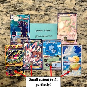 May include: A collection of Pok&eacute;mon trading cards featuring various characters. The cards display colorful illustrations and text, with a small cutout for a perfect fit. The text "Example Products" and the shop's Instagram handle are also visible.