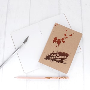 Caderno de papel pequeno &quot;Passageiro Negro&quot;