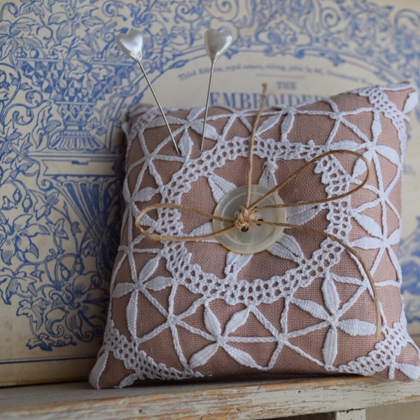 Vintage lace and linen pincushion.