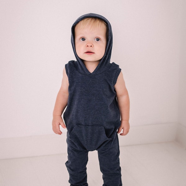 Super soft hooded tank style pocket romper. Snap-less, soft cotton. Custom made 0 to 4t in many different colors.