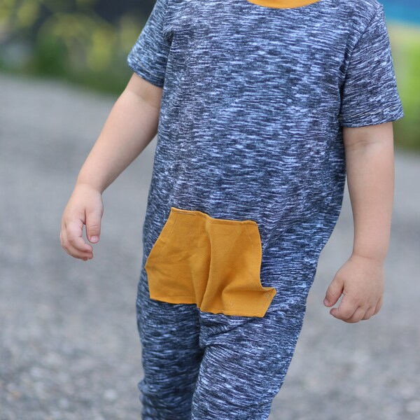 Clearance sale!  Super soft short sleeve pocket romper. Snap-less, soft cotton.