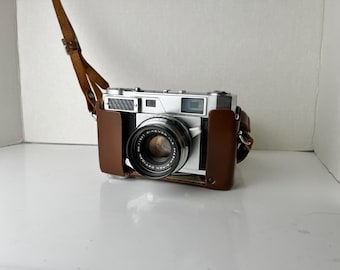 Ricoh 519M 35mm rangefinder with a 4.5cm f/1.9 Rikenon coated in 6-elements